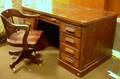 Mahogany Veneer DoublePedestal Flattop Desk with Swivel Desk Chair