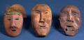 Three Carved Wood Inuit Masks
