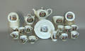 Porcelain tea service with transfer decoration of Welsh costumes