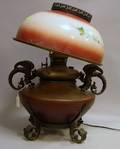 Bradley  Hubbard Victorian Patinated and Painted Metal Kerosene Table Lamp with Painted Floral Decorated Glass Shade