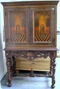 Berkey  Gay Furniture Jacobeanstyle Inlaid and Paint Decorated TwoDoor Walnut Veneer Linen Cabinet on Stand