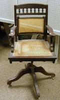 Renaissance Revival Walnut and Caned Swivel Desk Chair
