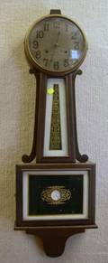 New Haven Clock Co Mahoganyfinished and ReversePainted Banjo Wall Timepiece
