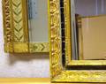 Neoclassical Paint Decorated Giltwood Mirror and a Neoclassical Giltwood Mirror