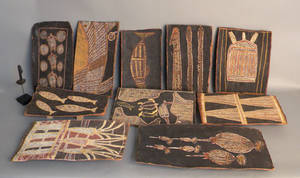 Ten aboriginal bark paintings together with an Akan tribe spoon