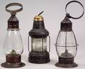 Three Tin and Glass Lanterns