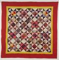 Pieced Cotton Triangles Charm Quilt