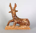 Carved and painted pine reclining stag late 19th c