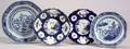 Four Blue and White Pottery Plates