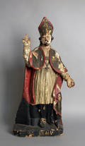 Carved and painted figure of a cardinal