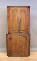 Pennsylvania walnut twopart corner cupboard