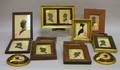 Eleven Framed Silhouettes and a Pair of Silhouettestyle Plaques