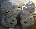 Pair of Chinesestyle Carved Cast Stone Foo Dogs