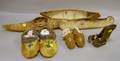 Two Native American Birch Bark Canoes and a Hide Kayak Models and Three Pairs of Hide and Skin Moccasins