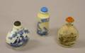 Two Chinese Porcelain Snuff Bottles and an Interior Paint Decorated Glass Snuff Bottle