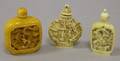 Two Carved Ivory Snuff Bottles and a Carved Resin Snuff Bottle