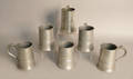 Five English pewter mugs marked Loftus