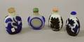 Four Chinese Overlay Glass Snuff Bottles