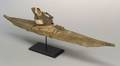 Inuit Hide and Wood Kayak and Paddler