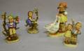 Four Hummel Ceramic Figures