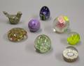 Seven Art Glass Paperweights and an Art Glass Figural