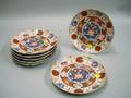 Three Japanese Blue and White Decorated Porcelain Plates and a Cloisonne Plate