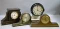 Three Mantel Clocks and a Marinestyle Plastic Cased Wall Clock