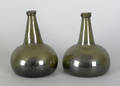 Two blown olive glass squat bottles 18th c