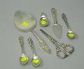Six Pieces of Sterling Silver Flatware and a Pair of Sterling Silver Grape Shears