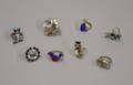 Seven Southwestern Silver and One 18kt Gold Rings