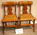 Four Classical Caned Tiger Maple Side Chairs