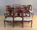 Nine sabre leg dining chairs