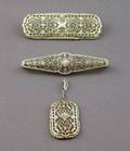 Two 14kt White Gold and Diamond Accented Lacework Brooches