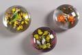 Three Rick Ayotte Glass Paperweights
