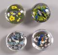 Four Rick Ayotte Glass Paperweights