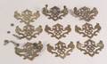 Nine Chippendale Brasses