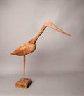 Carved pine heron