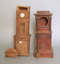 Two tall clock form watch hutches