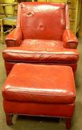 Red Leather Upholstered Armchair and Ottoman