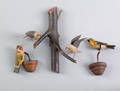 Four carved birds early 20th c
