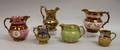Six English Copper Lustre Jugs