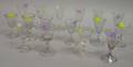 Sixteen Colorless Blown Glass Wine Stems