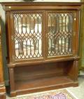 Neoclassical Carved Mahogany and Mirrored Glass TwoDoor Bookcase