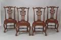 Set of Four Chippendalestyle Carved Mahogany Side Chairs with Needlepoint Upholstered Seats