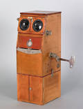 Mahogany table top stereoscope with slides