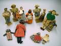 Collection of Five Small Folk Cloth Dolls and Seven Small Ethnographic Costume Dolls