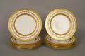 Set of twelve Coalport gilded plates retailed by Tiffany  Co