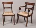Set of Seven Greek Revival Carved Mahogany Dining Chairs