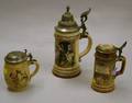 Three German Stoneware Lidded Steins