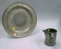 English Pewter Quart Pouring Stein and a Charger